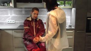 Miss Petra and new model Miss Jessica in AGU raingear have some bondage fun