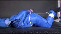 Lucy tied and gagged with ropes on bed wearing sexy blue oldschool downwear (Video)