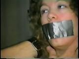25 YR OLD CHARLENE HOGTIED, SELF TAPE BONDAGE & GAGGING, HANDCUFFS, THUMB CUFFS IN LINGERIE (D42-9)