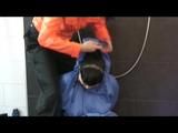 Jill in a shiny blue rainsuit tied,hooded and gagged by Simone under the shower (Video)