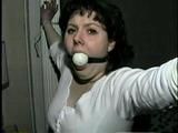 BALL-GAGGED, & TIED BETWEEN  2 PILLARS DAMSEL (D16-12)