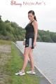 Enni outdoor wearing a sexy black shiny nylon shorts and a black top (Pics)