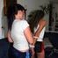 Petra tied and gagged by Jill in shiny shorts