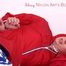 Pia tied and gagged on bed in a shiny bluerainpants and red rainjackert (Pics)