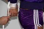 Pia tied and gagged in shiny nylon shorts