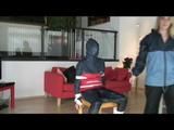 03:40 Min. video with Nicole tied and gagged in shiny nylon rainwear