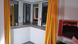 She gets fucked in front of the hotel window