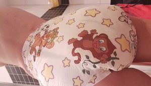 Emma in her super full Rearz Safari diaper