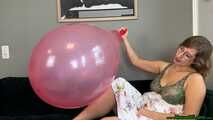 Blow2Pops custom red Longneck balloon in bra