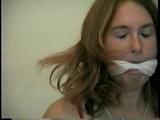 24 Yr OLD CRAFTER IS CLEAVE GAGGED, MOUTH STUFFED, HAND GAGGED, OTM GAGGED & TIED TO A CHAIR (D55-6)