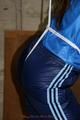 Alina tied and gagged in shiny nylon clothes