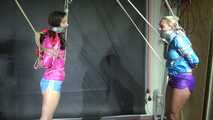 Aiyana and Ms Ungeniert in shiny nylon Shorts and Windbreaker tied and gagged together