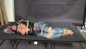 Alice bound, gagged and vibed in a shiny nylon Windbreaker. She enjoyed it :)