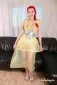 Morrigan - posing in yellow trash bag dress