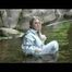 Sophie enjoying the water and weather on a river wearing supersexy grey rainwear (Video)