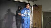 Myxxxy bound and gagged in a shiny nylon Skisuit