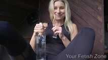 Vanessa is drinking in a hut