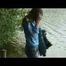 Alina walking on a lake wearing sexy shiny nylon shorts under her jeans and a down jacket (Video)