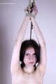 Tracy: topless barefoot girl with noose on her neck, having her to stand on her tip toes to breathe, is tickled by camera man