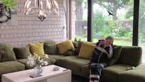 Rachel Adams bound and gagged by an Intruder in shiny Rainwear