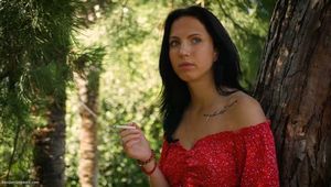 Elizaveta is smoking two all white cigs in a row