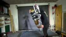 Rachel Adams bound, gagged and suspended in shiny nylon Down