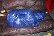Sexy Sonja changing clothes to a brown down pants and a blue down jacket and lolling on the sofa (Pics)