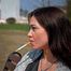 answering questions while smoking 120mm Saratoga cigarette