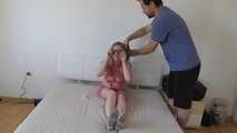 Maria roped on her bed 1/2