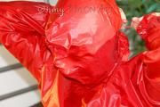 Lucy wearing a sexy shiny nylon shorts and two rain jackets feeling breath control (Pics)