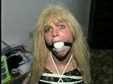 GREEN EYED, BLOND BOMBSHELL, CROTCH ROPED & BALL-GAGGED (D20-14)