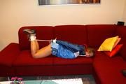 Katharina bound and gagged in shiny nylon shorts