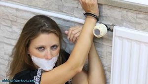 Sophia as a helpless cuffed maid