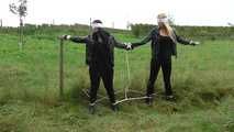 Jasmin & Larissa tied on fence Photoshoot