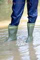 Stella jumping in puddles wearing sexy blue shiny nylon rainwear and rubber boots (Pics)