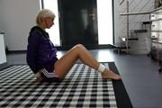 Pia tied and gagged in shiny nylon shorts