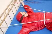 A nice cuty hooded, tied and gagged on bed