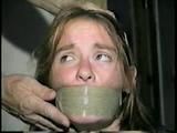 24 Yr OLD CRAFTER IS WRAP TAPE GAGGED, BAREFOOT TICKLED, TOE-TIED, BALL-TIED, HANDGAGGED & MOUTH STUFFED (D61-1)