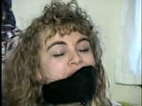 SEXY LITTLE CARRIE SOCK STUFFED IN MOUTH, CROTCH ROPED, CLEAVE GAGGED & HOG-TIED (D43-3)