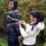 Jill ties her friend in shiny downjackets