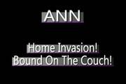 Video : Hogtied asian girl Ann is struggling on the couch in her sexy black dress.