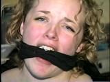 19 YEAR OLD COLLEGE STUDENT SHANA IS TIGHTLY BOUND TO A CHAIR AND HAS HER MOUTH STUFFED & CLEAVE GAGGED ON SCREEN 2 TIMES (D53-10)