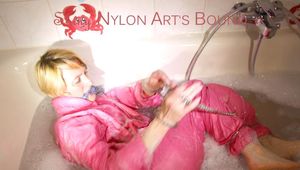 Sonja ties and gagges herself in the bath tub with cuffs wearing sexy shiny nylon downwear (Pics)
