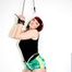 Jill tied and gagged over head wearing a sexy green shiny nylon shorts and a black shirt (Pics) 