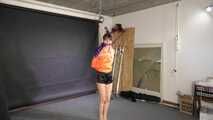 Lana bound and gagged in shiny Shorts and Windbreaker 