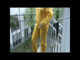 Get 2 Videos with Monika enjoying her Shiny Nylon Rainwear from our 2010 Archive