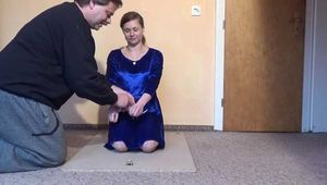 Sunny cuffed on the floor