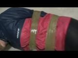 0300 min video with Simone tied and gagged in shiny nylon rainware night vision