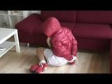 03:00 Min. video with Nina tied and gagged in a shiny nylon downjacket
