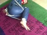 01:00 Min. video with an archive girl tied and gagged in shiny nylon rainwear